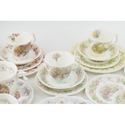 187 - Royal Doulton Brambly Hedge items to include beakers such as Spring, Autumn and Winter, with 3 trios... 