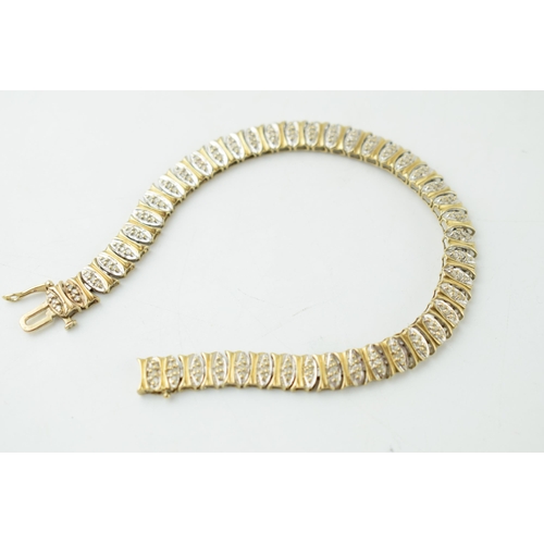 339 - 9ct hallmarked gold bracelet set with white stones, 18cm, 10.2g.