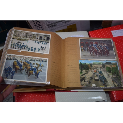 606 - 45 x albums of military thematic postcards & photographs, a box off 100 or so old postcards, an earl... 