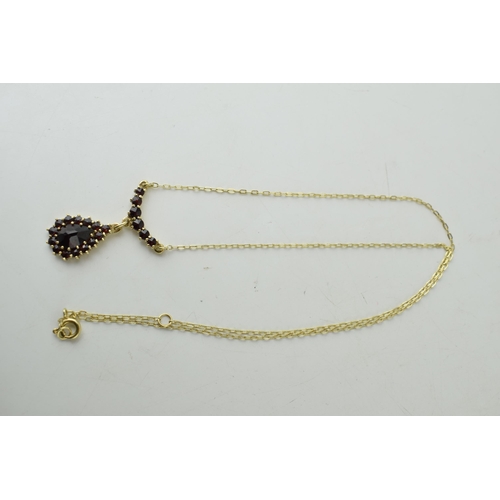 346 - 14ct gold garnet pendant and chain, 45cm length in total.  4.6g.