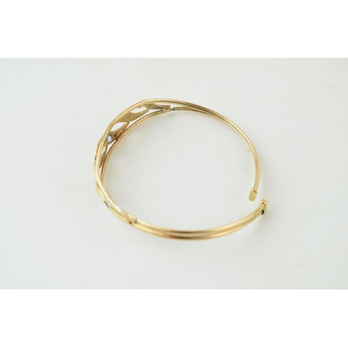 352 - 9ct gold sapphire & white stone bangle, broken with wire core, and a bangle of foreign origin with i... 