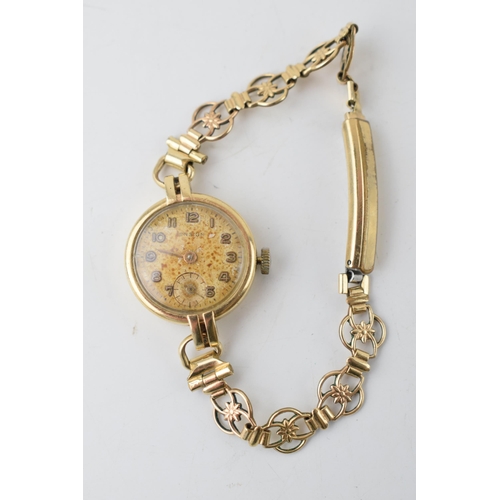 363 - 9ct gold wristwatch, not working, on a rolled gold bracelet