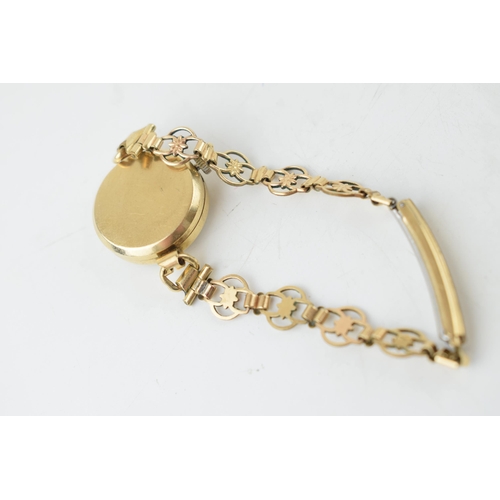 363 - 9ct gold wristwatch, not working, on a rolled gold bracelet