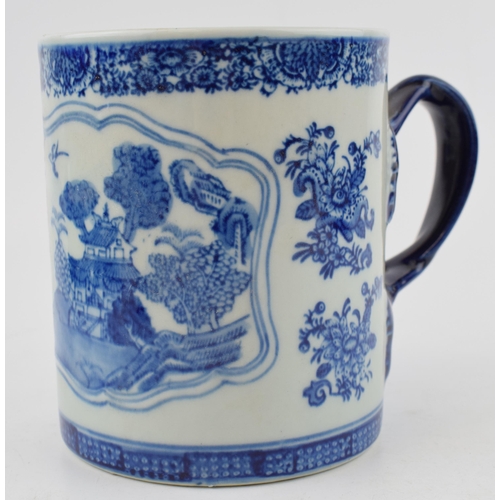 632 - A large oversized oriental blue and white tankard, with ornate handle, character mark to base, late ... 