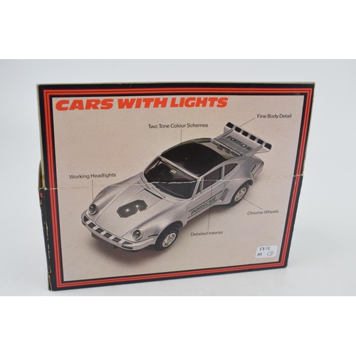 642 - A boxed vintage Scalextric C.427 Red Porsche Turbo with working head and brake lights.