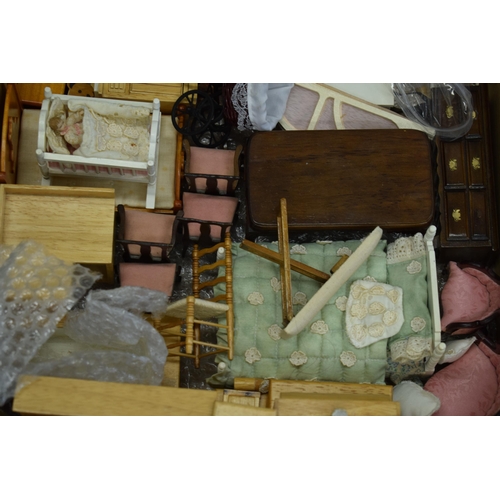 655 - A good and interesting collection of dolls house furniture to include bedroom suites, people, househ... 