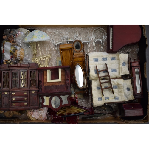 656 - A good and interesting collection of dolls house furniture to include bedroom suites, people, househ... 