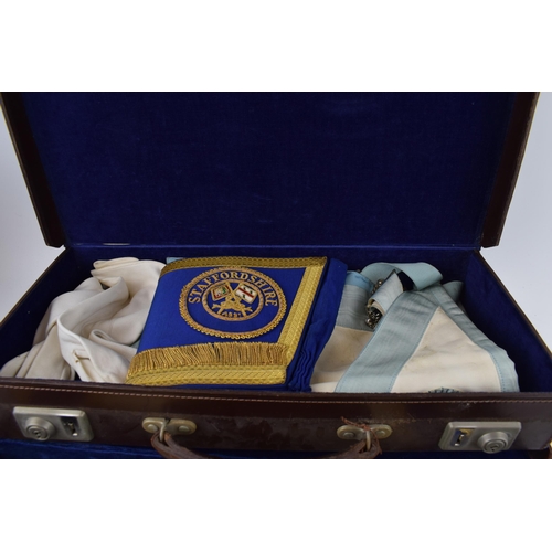 434 - Of masonic interest, two leather masonic cases with Staffordshire embroidererd regalia and gloves. (... 