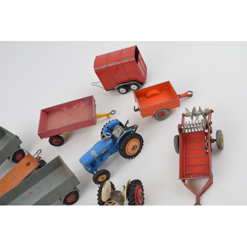 672 - A mixed collection of vintage die-cast toys to include Dinky Toys and Corgi Toys relating to farming... 