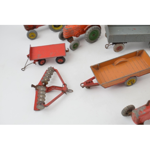 672 - A mixed collection of vintage die-cast toys to include Dinky Toys and Corgi Toys relating to farming... 