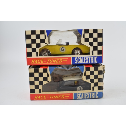 692 - Two vintage boxed Tri-ang Scalextic cars, 