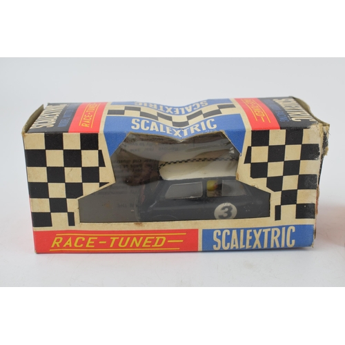 692 - Two vintage boxed Tri-ang Scalextic cars, 