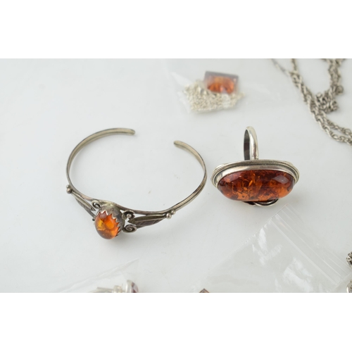 366C - 8 pieces of silver & faux amber, to include 3 pendants & chains, 2 pairs of earrings, large cross & ... 