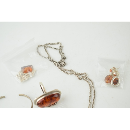 366C - 8 pieces of silver & faux amber, to include 3 pendants & chains, 2 pairs of earrings, large cross & ... 