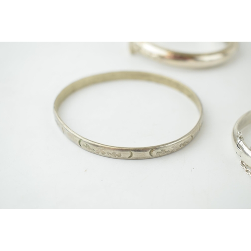 366D - 4 assorted silver bangles, 1 marked 825, 114g