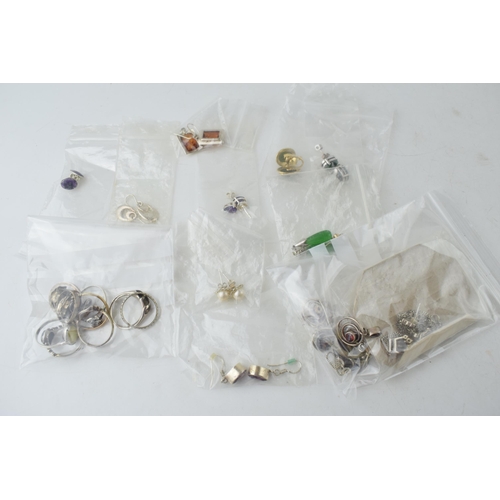 366H - 10 silver rings, some with stones, 12 pairs of silver earrings and 3 silver pendants with silver cha... 