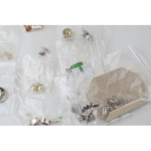 366H - 10 silver rings, some with stones, 12 pairs of silver earrings and 3 silver pendants with silver cha... 