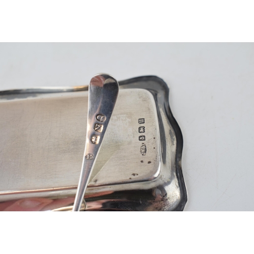 377 - Silver pin tray with striped decoration, Birm 1919, with a Georgian mustard spoon, combined 39.0 gra... 