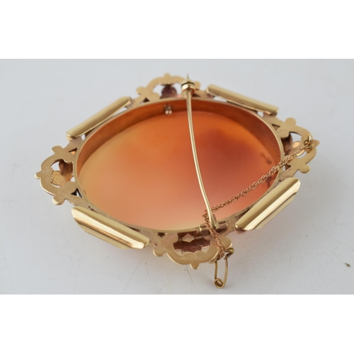 383 - 9ct gold cased large cameo brooch, with a lady's profile, 31.4 grams, 8cm long.