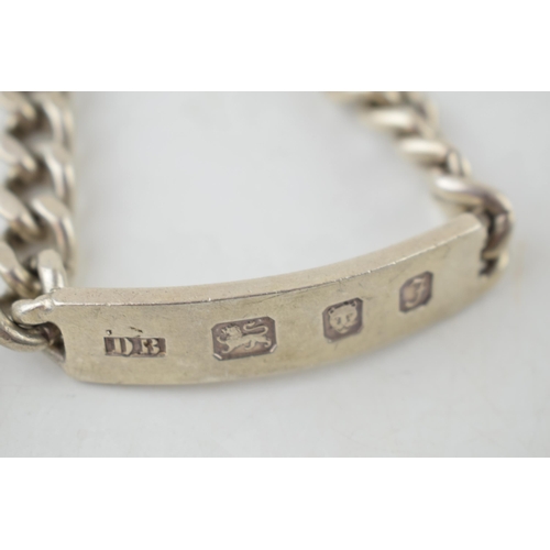 390 - A silver ID bracelet with hallmarks to front, vacant rear, with a silver curb bracelet, 106.2 grams ... 