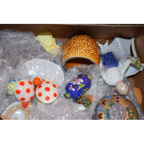 63 - A collection of pottery items and collectables to include studio pottery figures, toadstools, vintag... 