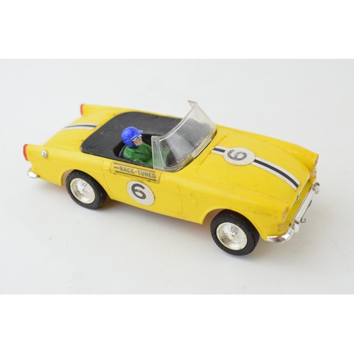 692 - Two vintage boxed Tri-ang Scalextic cars, 