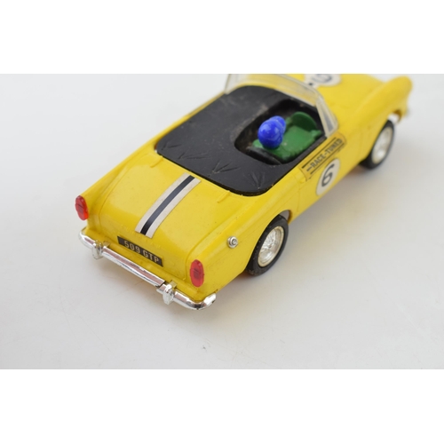 692 - Two vintage boxed Tri-ang Scalextic cars, 