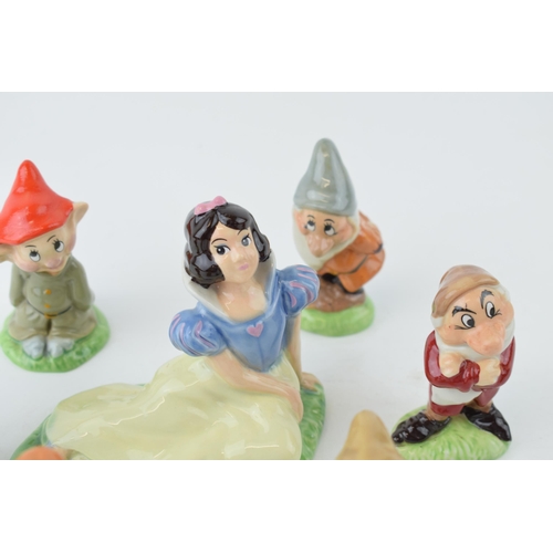 110 - Wade Snow White and the Seven Dwarves to include Snow White and 6 dwarves (7).