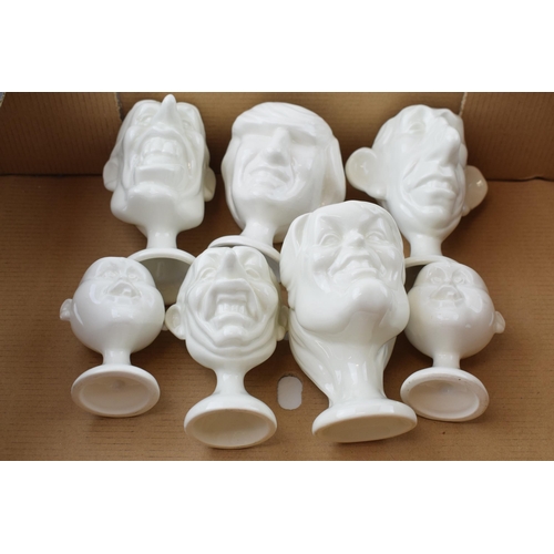 120 - A collection of Fluck and Law Spitting Image egg cups to include Charles, Diana, William as a baby, ... 