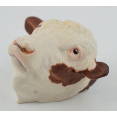 176 - Unusual Beswick wall hanging in the form of a Hereford bull's head, 8cm long.