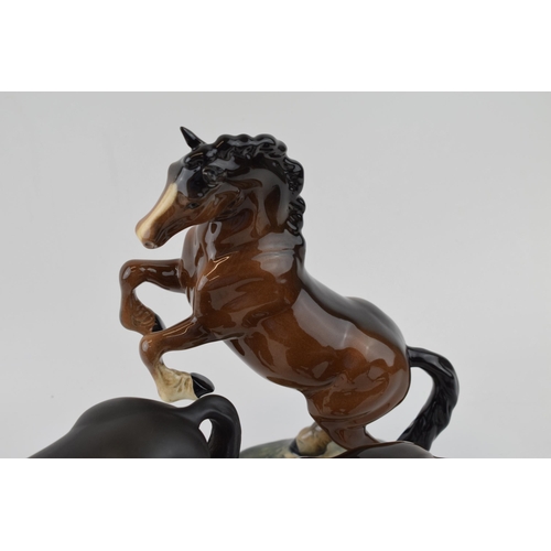 187 - Beswick rearing horse 1014 (restored tail) with a Black Beauty and a mare facing right (3).