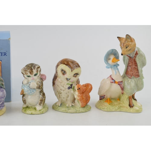 201 - A collection of Beswick Beatrix Potter figurines to include 'Jemima Puddleduck With Foxy Whiskered G... 