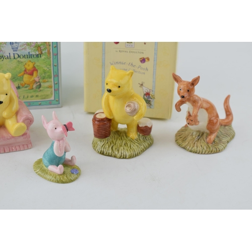 211 - Royal Doulton Winnie-the-Pooh figures to include two boxed examples 'Pooh Collecting The Honey Pots'... 