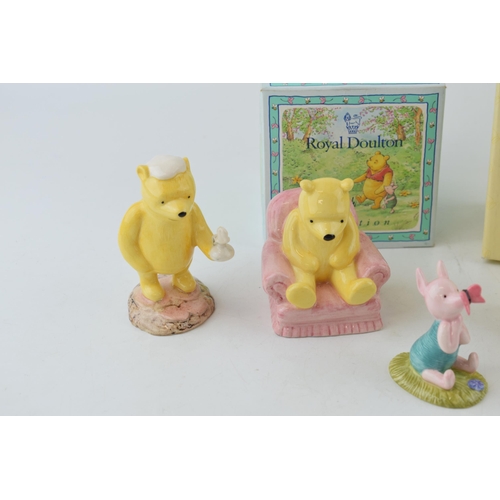 211 - Royal Doulton Winnie-the-Pooh figures to include two boxed examples 'Pooh Collecting The Honey Pots'... 