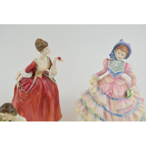 227 - A collection of Royal Doulton figures to include 'Hannah' HN 3369, 'Flower' of Love HN 3970, 'Solitu... 