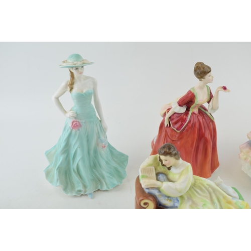 227 - A collection of Royal Doulton figures to include 'Hannah' HN 3369, 'Flower' of Love HN 3970, 'Solitu... 