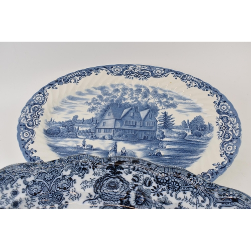 282 - Two blue and white meat platters, Heritage Hall by Johnson Bros, together with larger with scene of ... 