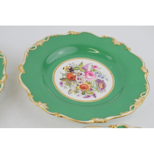 283 - Four hand-painted cabinet plates with green ground and gilt edging with centre panel depicting flora... 