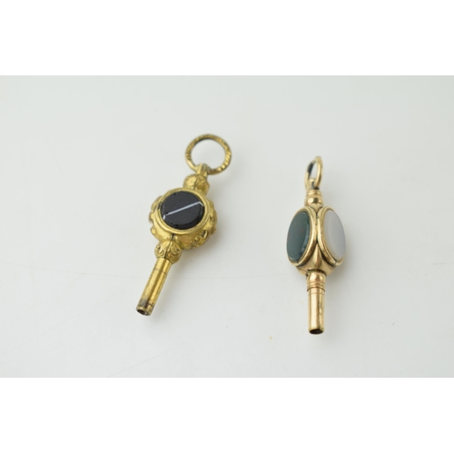 376 - A pair of gilt metal watch keys set with hard stones, (2).