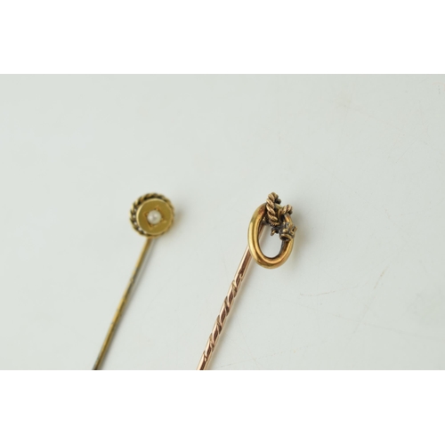 380 - A pair of 9ct gold stick pins, one set diamond, the other set pearl, 2.4 gram combined, 1 base metal... 