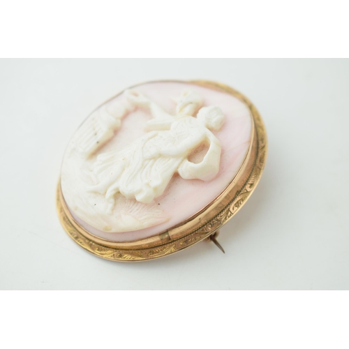 381 - Victorian gold cased cameo brooch, carved coral, 54mm tall.