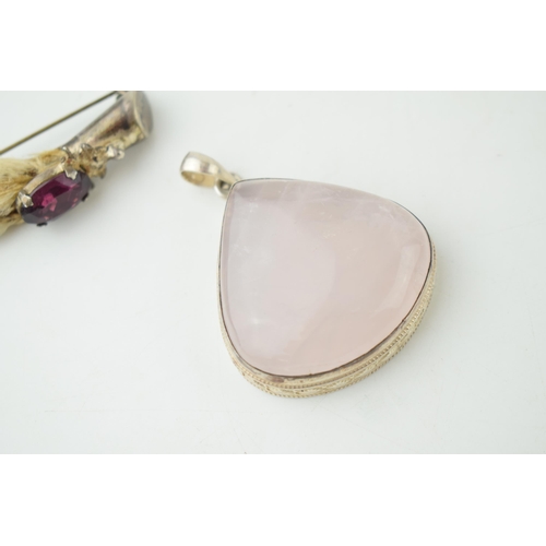 392 - A Victorian silver stone set ptarmigan brooch with a silver cased rose quartz large pendant (2).