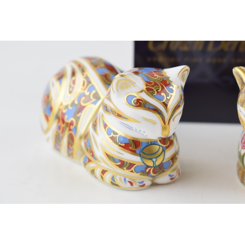 48 - Two Royal Crown Derby Cat paperweights, Cottage Garden Cat, 21st anniversary special gold stopper, b... 