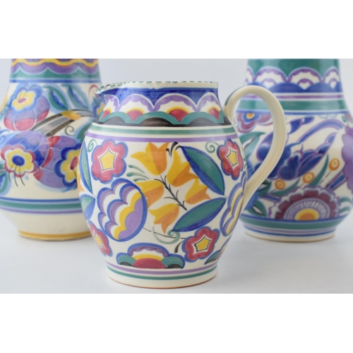 67 - Poole Pottery to include a near pair of low-shouldered bulbous vases in the XA and HE patterns with ... 