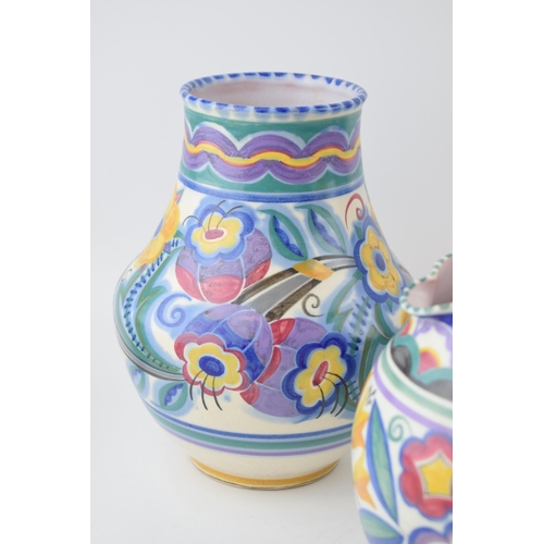 67 - Poole Pottery to include a near pair of low-shouldered bulbous vases in the XA and HE patterns with ... 