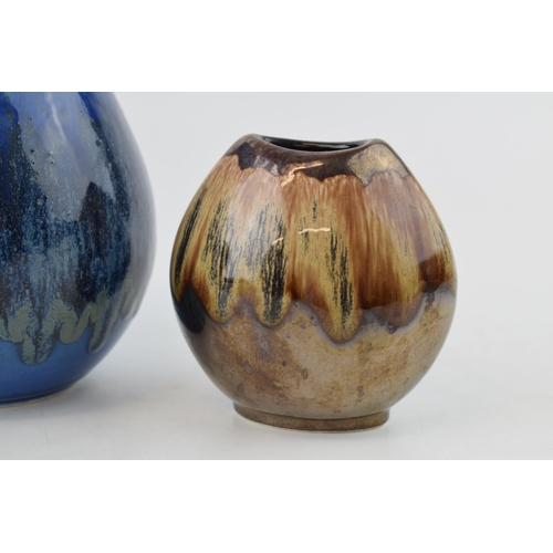 68 - Poole Pottery vases to include a bulbous vase in blue glaze, a similar short vase in blue and orange... 