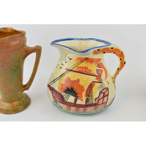 83 - A large Wadeheath embossed galleon jug with a Flaxman ware Art Deco jug (2), tallest 23cm tall.