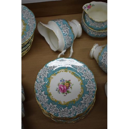 253 - Royal Albert tea ware in the Enchantment pattern to include a teapot (finial af), 6 trios, a milk ju... 