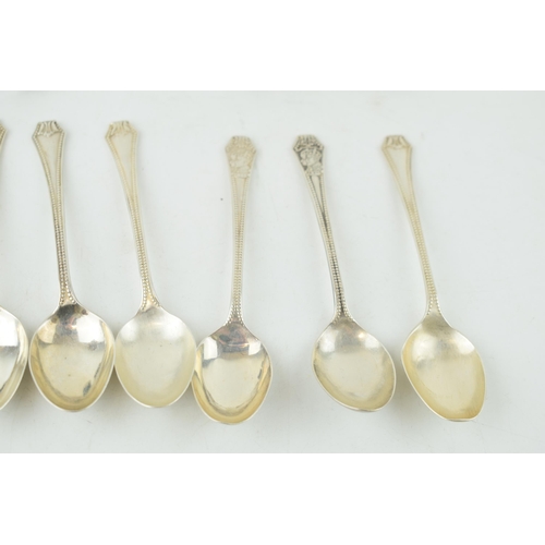 289 - A collection of silver spoons. Hallmarked Birmingham. Together with two boxed napkin rings and two p... 