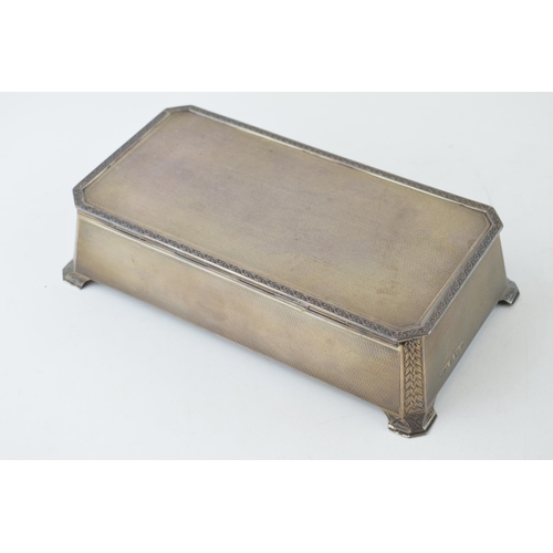 290 - Silver cigarette box hallmarked and inscribed with monogram to inside of lid, dated 1931.Wood liner ... 